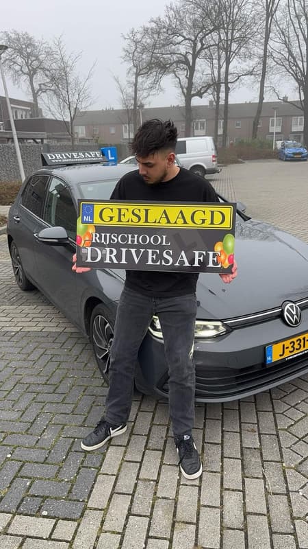 Photo of a friendly driving instructor.